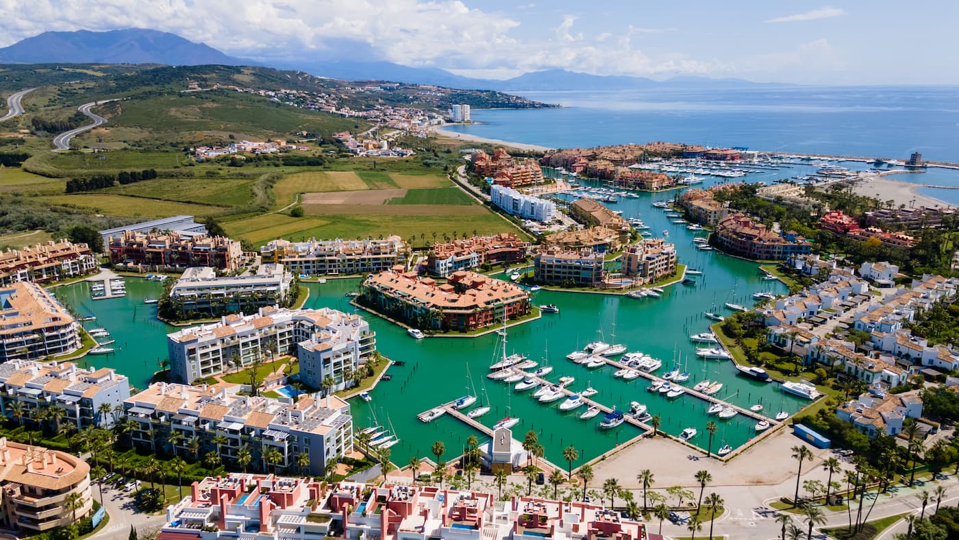 Aerial view of Sotogrande marina, coastline and surrounding hills